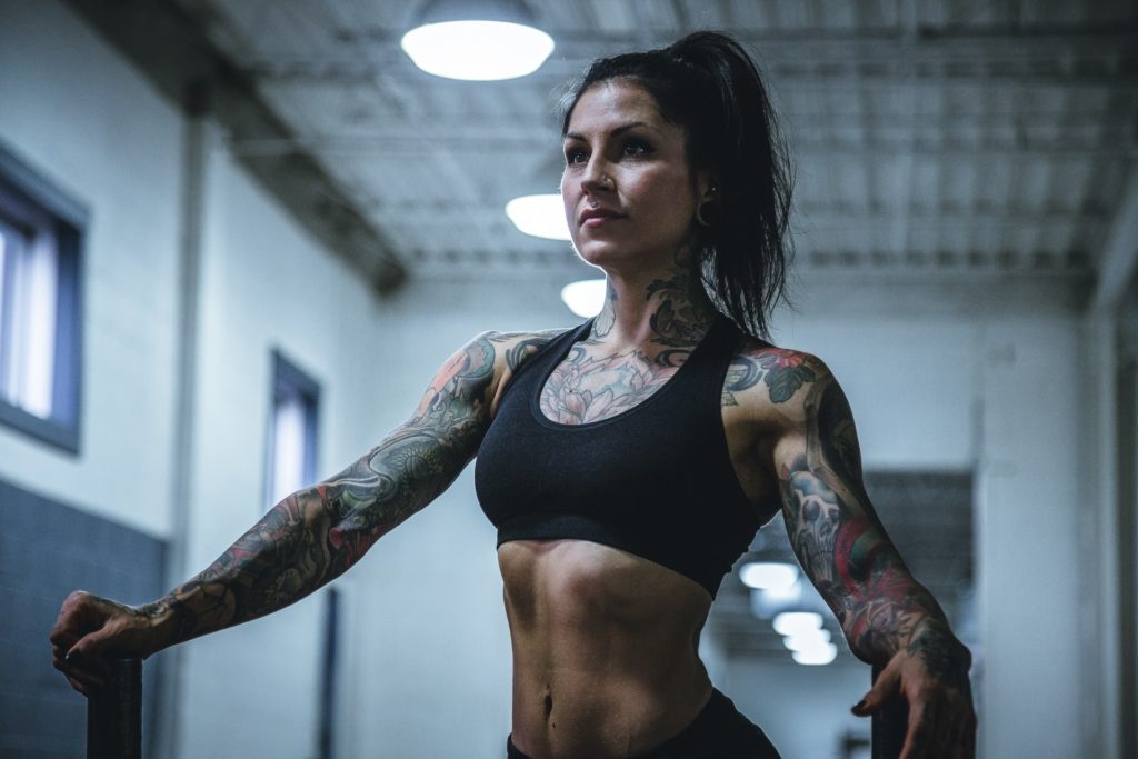 Tattooed Woman displaying how to create mental strength