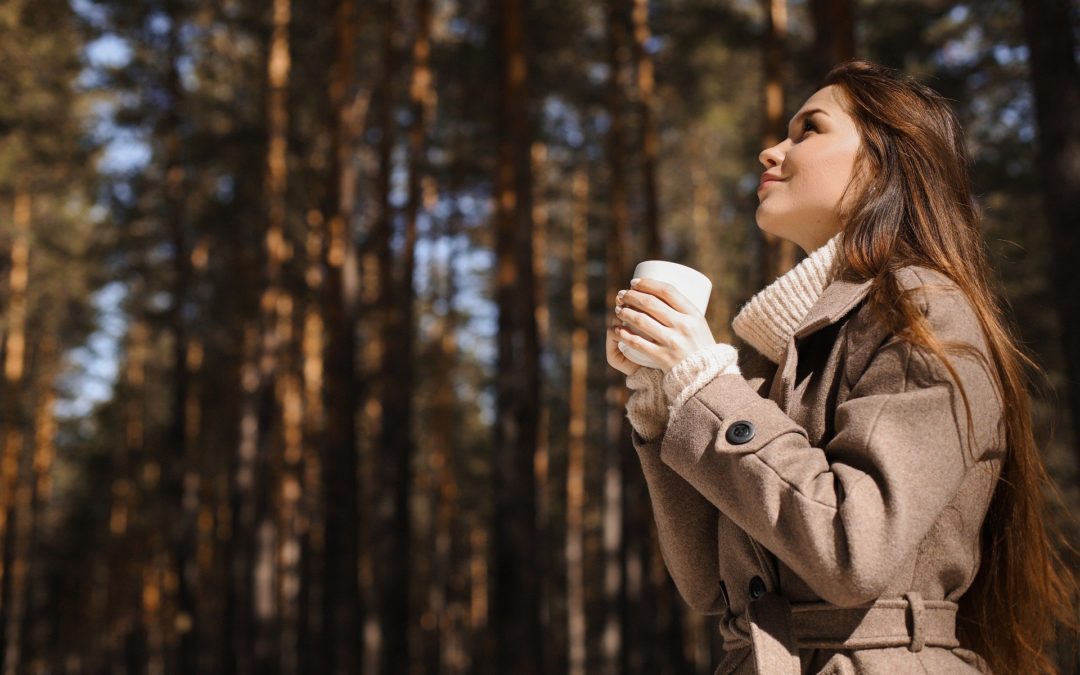 Picture of a woman in the woods showing how to build resilience