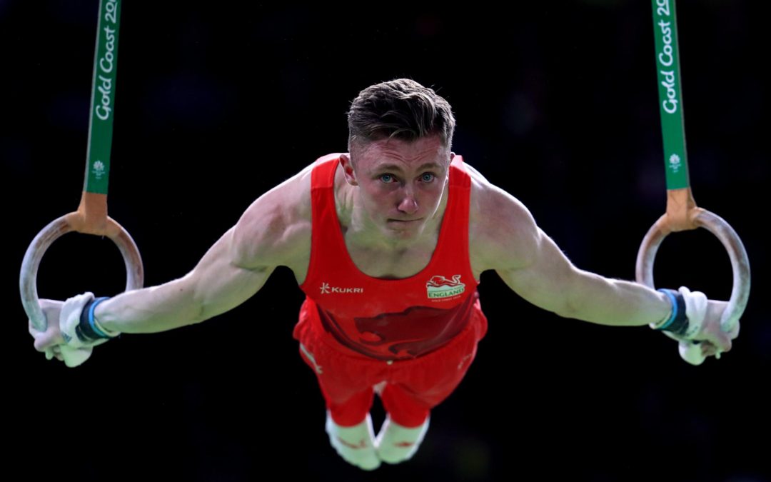 Male Gymnast Nile Wilson on the rings for John R. Miles blog showing healthy habits